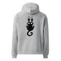 Sudadera unisex color gris con estampado de gato negro en la espalda. Ropa para amantes de los gatos de la marca Dogma BCN.